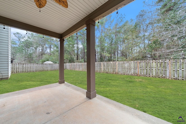 view of patio featuring ceiling fan