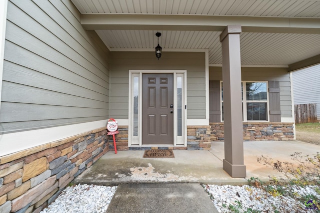 entrance to property with a porch