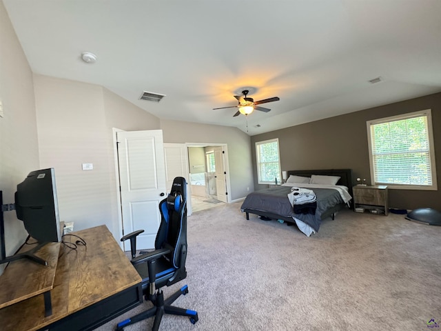 bedroom with visible vents, a ceiling fan, carpet flooring, and ensuite bath