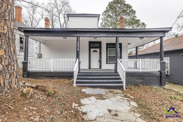 view of front of home featuring covered porch