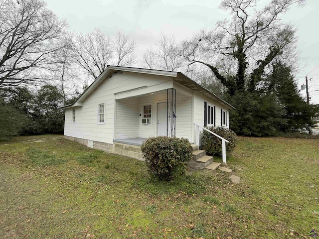 view of front of home with a front yard