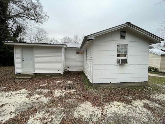 back of house with cooling unit