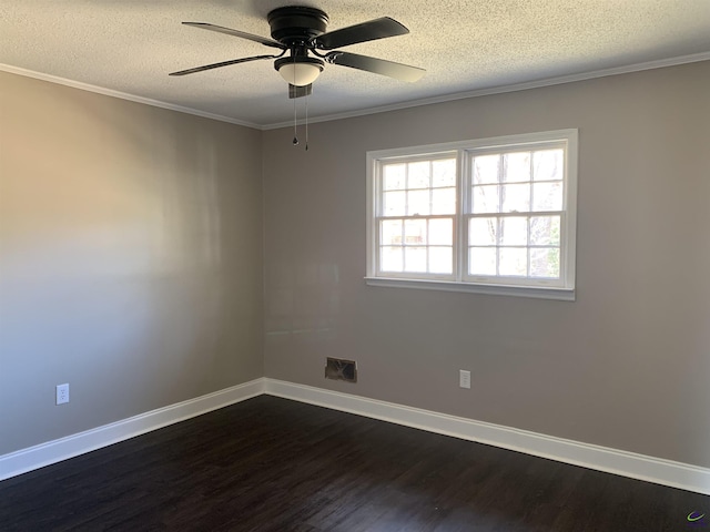 empty room featuring ceiling fan, crown molding, dark wood-type flooring, and a textured ceiling