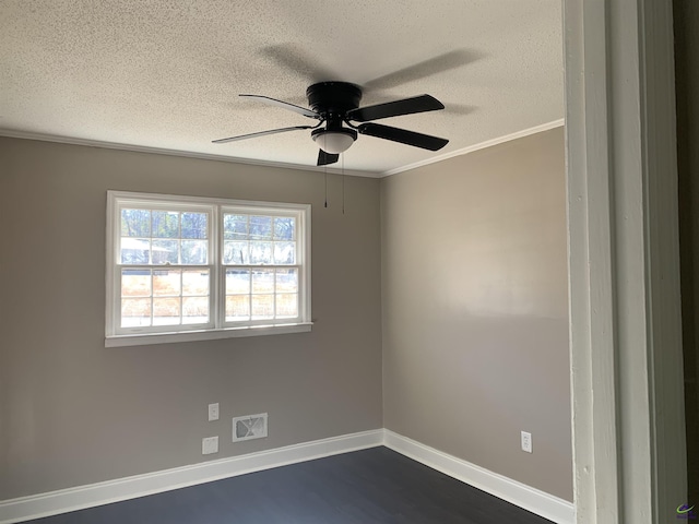 unfurnished room featuring ceiling fan, ornamental molding, dark hardwood / wood-style floors, and a textured ceiling