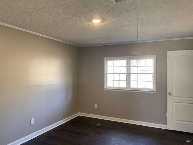 empty room with dark hardwood / wood-style flooring, crown molding, and a textured ceiling