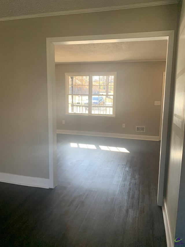 unfurnished room featuring dark wood-type flooring