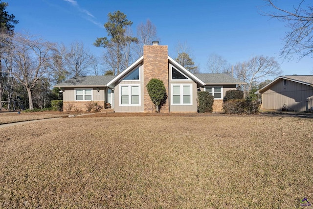 view of front of home with a front yard