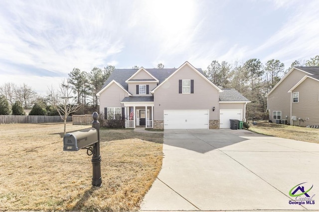 front facade featuring a garage and a porch