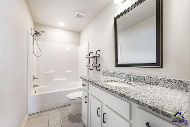 full bathroom with toilet, vanity, tile patterned floors, and  shower combination