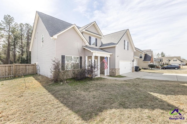 view of front facade with a front lawn and a garage