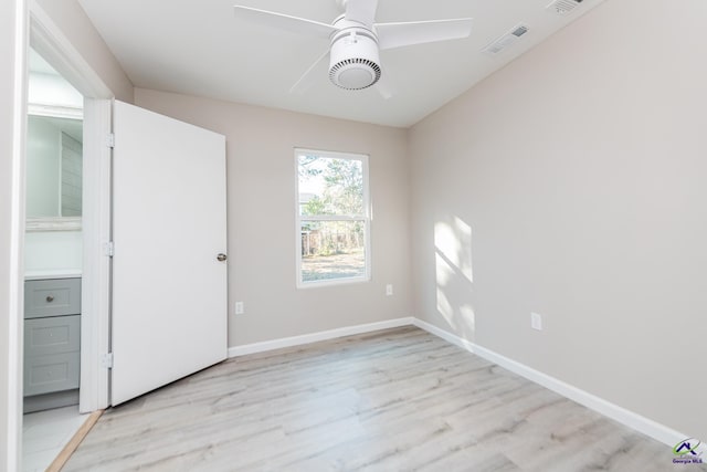 unfurnished bedroom with ceiling fan and light hardwood / wood-style floors