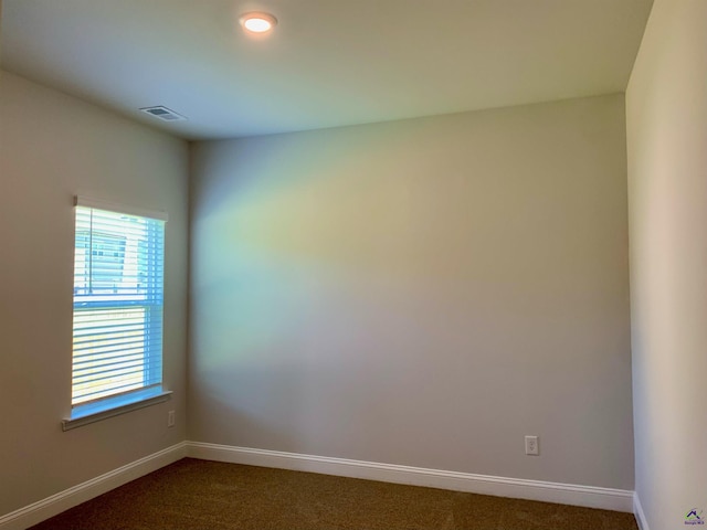 view of carpeted spare room