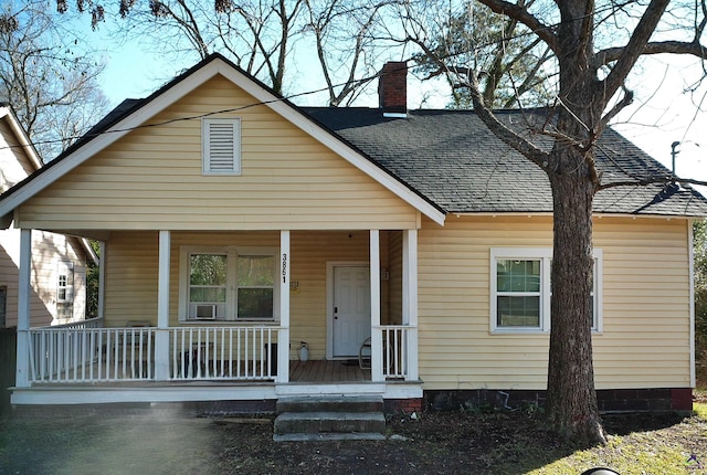 bungalow-style home featuring covered porch