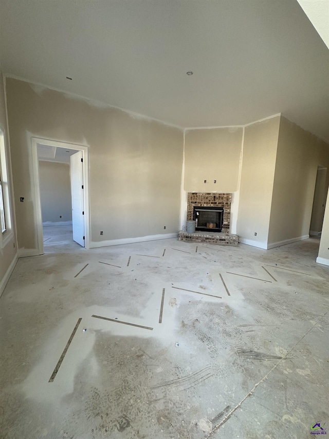 unfurnished living room with a fireplace