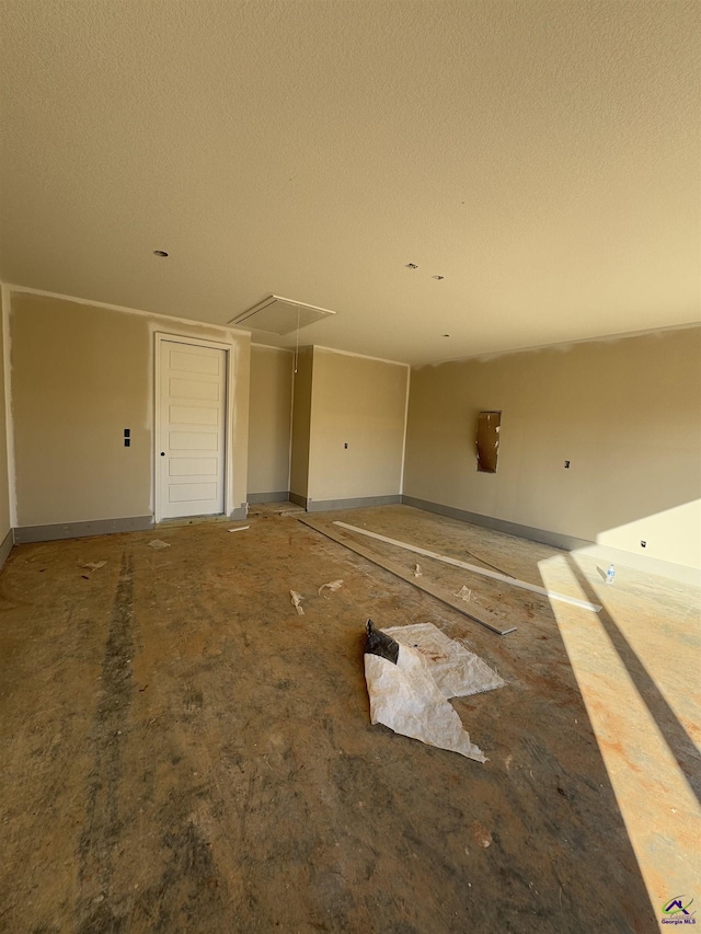 interior space with a textured ceiling