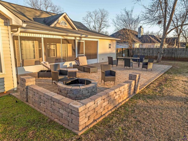 exterior space with a patio area and an outdoor living space with a fire pit