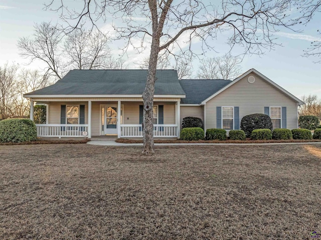 ranch-style house featuring a porch