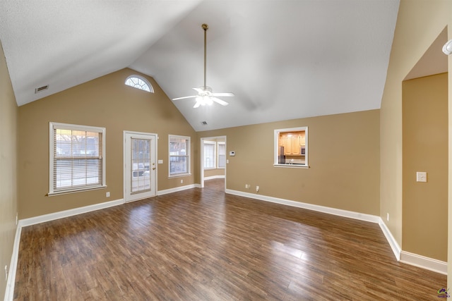 unfurnished living room featuring lofted ceiling, ceiling fan, and dark hardwood / wood-style floors