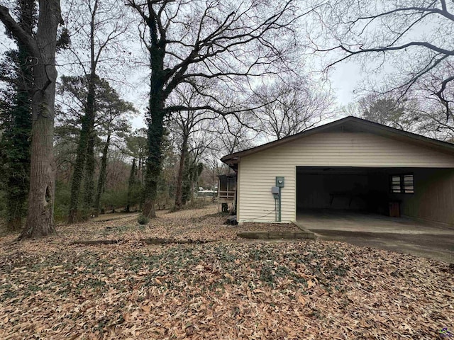 view of side of home featuring a garage