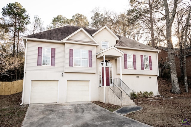 bi-level home featuring a garage