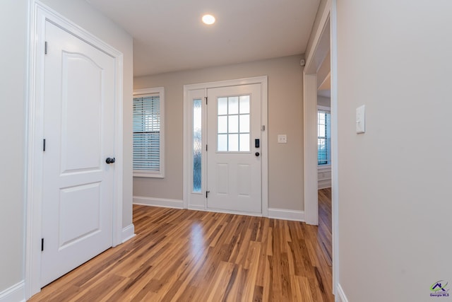 foyer with light hardwood / wood-style flooring