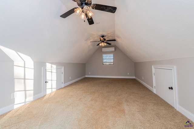 bonus room with ceiling fan, carpet flooring, lofted ceiling, and an AC wall unit