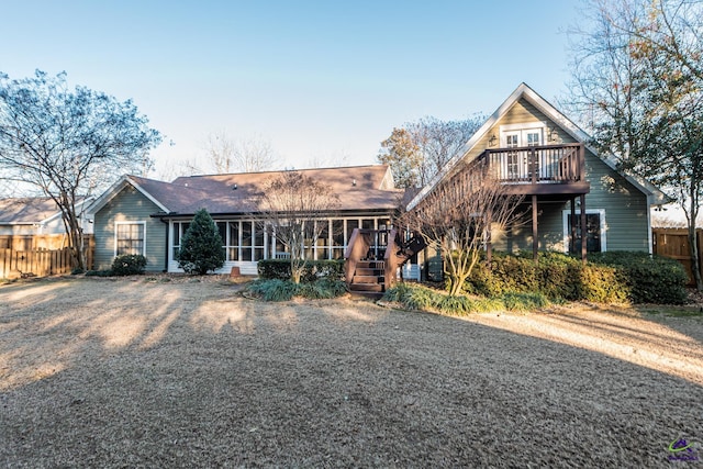 view of front of house featuring a deck and central air condition unit