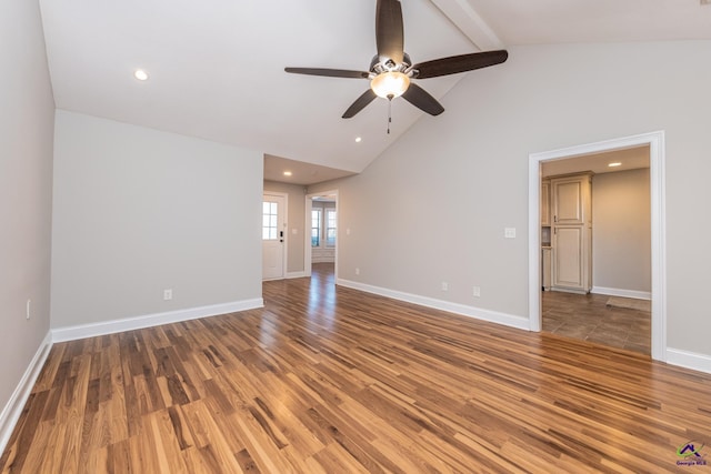 unfurnished room with hardwood / wood-style flooring, high vaulted ceiling, beam ceiling, and ceiling fan