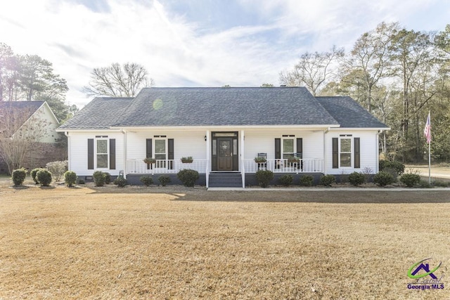 ranch-style house with a front yard and a porch