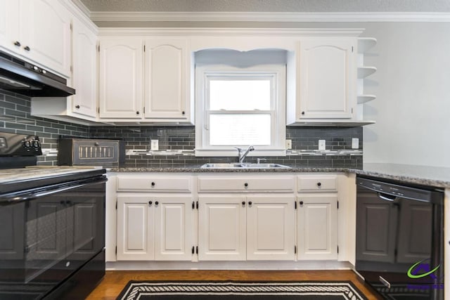 kitchen featuring black appliances, white cabinetry, dark stone counters, sink, and ornamental molding