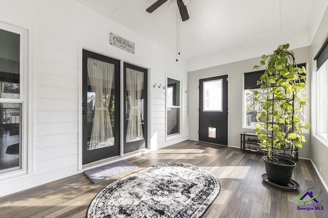 foyer with ceiling fan and dark hardwood / wood-style floors