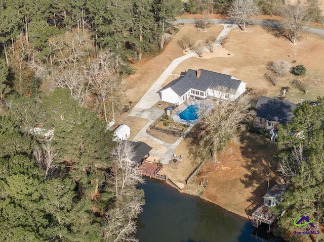 birds eye view of property featuring a water view