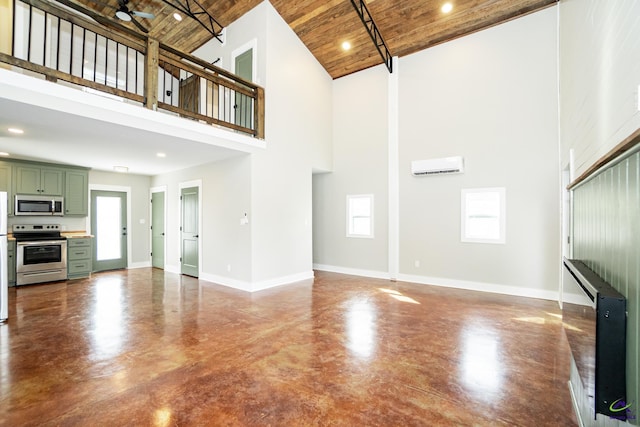 unfurnished living room featuring high vaulted ceiling, wood ceiling, plenty of natural light, and concrete flooring