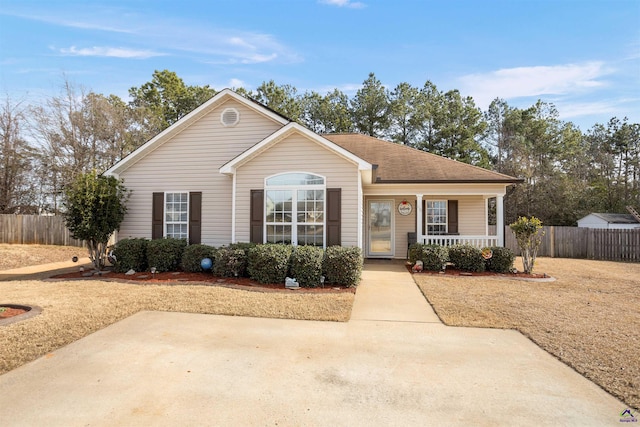 ranch-style house with covered porch