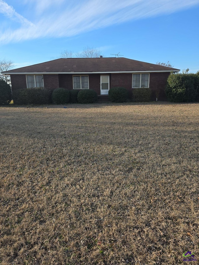 exterior space featuring a front lawn