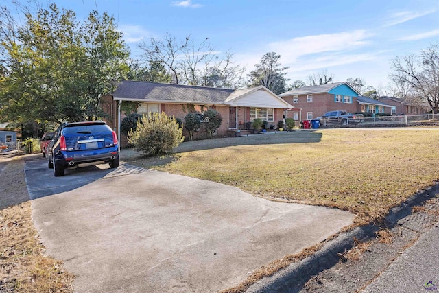 single story home with a front lawn