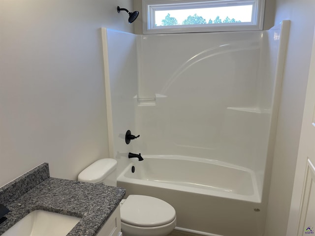 full bathroom with toilet, vanity, and tub / shower combination