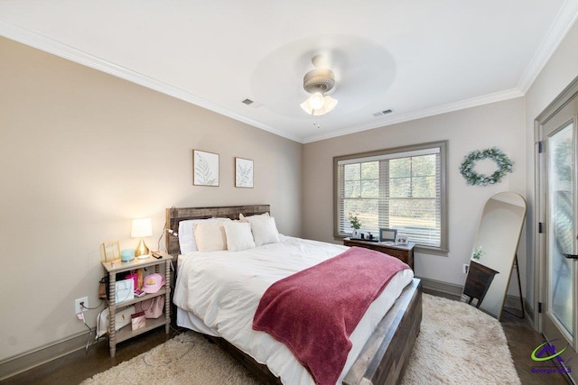 bedroom with ornamental molding and ceiling fan