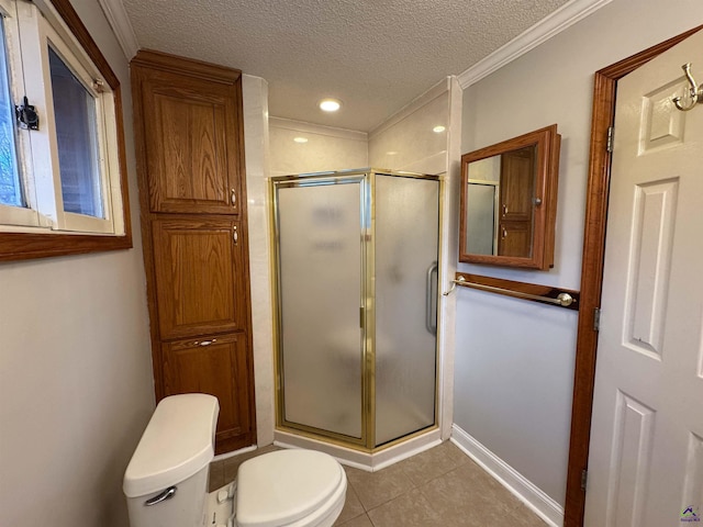 bathroom with a shower with shower door, a textured ceiling, ornamental molding, and tile patterned flooring