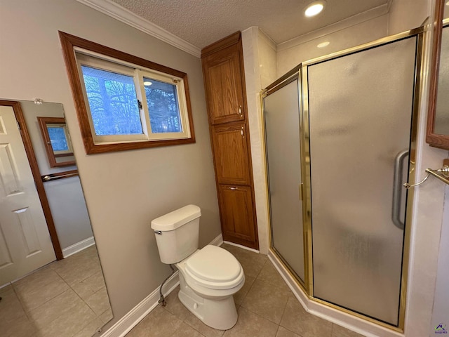 bathroom with a shower with shower door, tile patterned flooring, a textured ceiling, and ornamental molding