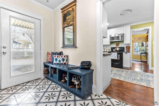 mudroom featuring crown molding