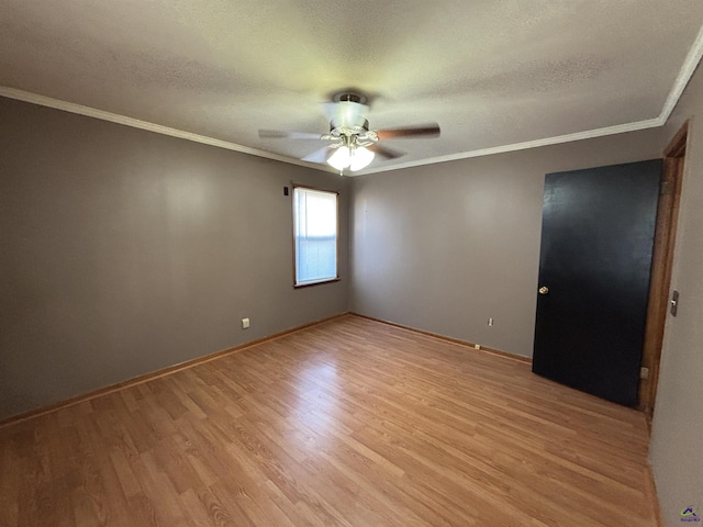 570 Perry Hwy, Hawkinsville, GA 31036 - empty room with ceiling fan, a textured ceiling, and light hardwood / wood-style flooring
