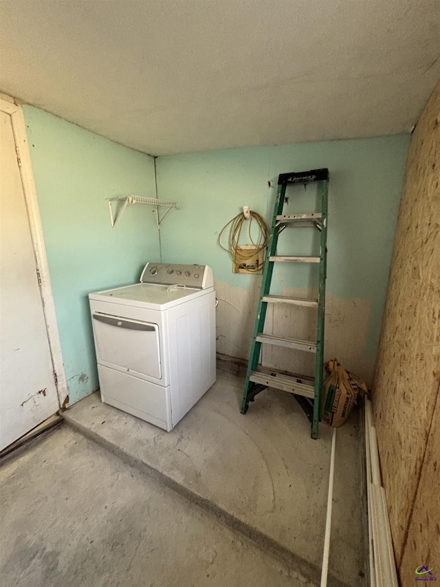 570 Perry Hwy, Hawkinsville, GA 31036 - laundry area with a textured ceiling and washer / clothes dryer