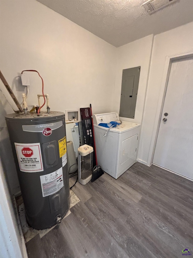 570 Perry Hwy, Hawkinsville, GA 31036 - laundry room featuring electric panel, washer / clothes dryer, water heater, dark wood-type flooring, and a textured ceiling
