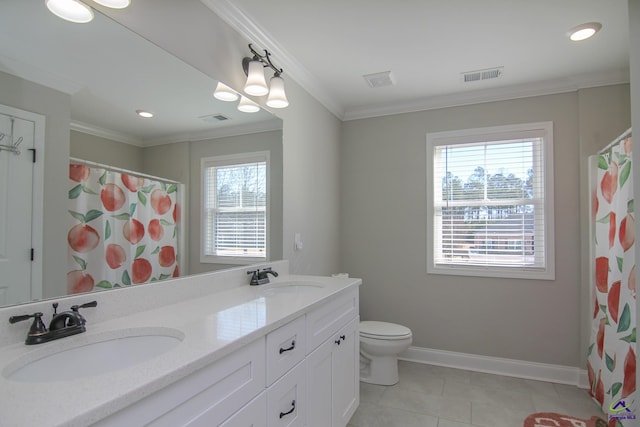 bathroom featuring toilet, vanity, plenty of natural light, and ornamental molding