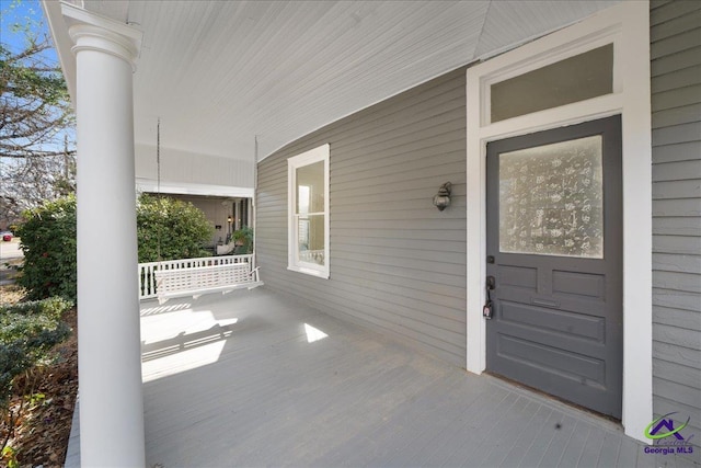 entrance to property with covered porch