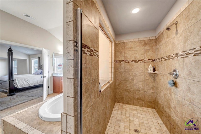 bathroom with plus walk in shower and lofted ceiling