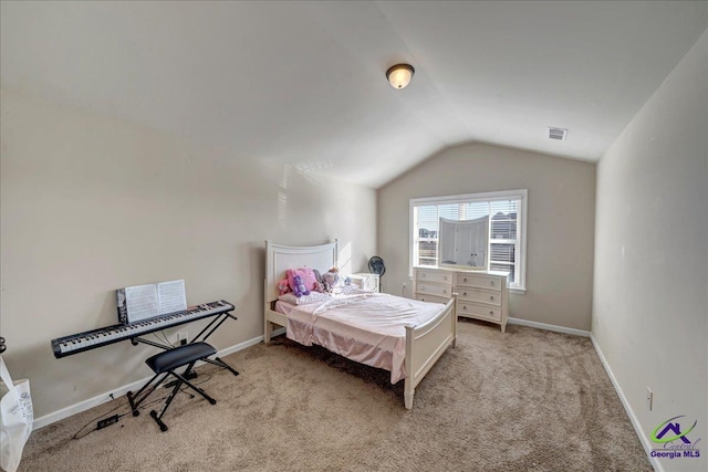 bedroom featuring light carpet and vaulted ceiling