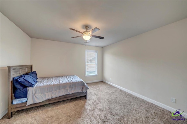 bedroom featuring ceiling fan and carpet floors