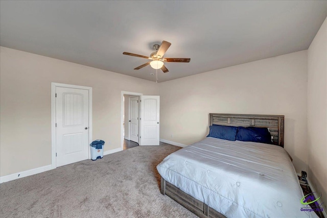 carpeted bedroom featuring ceiling fan